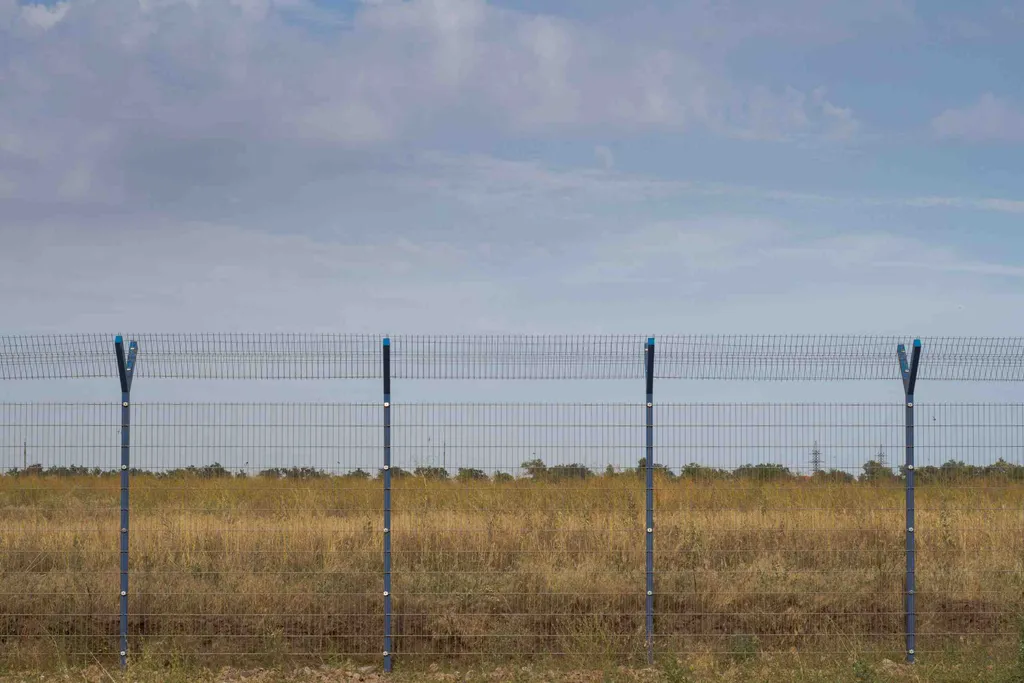 How to Install a Fence on Uneven Ground