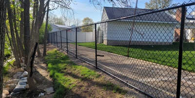 Chain Link - Black (w/ Top & Bottom Rail) fence installation in New Jersey | Fence Pro by Bruno