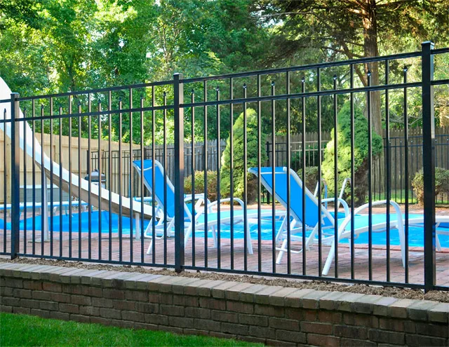 Eastern Ornamental 54-inch Style 200 — pool code black aluminum fence around a backyard pool