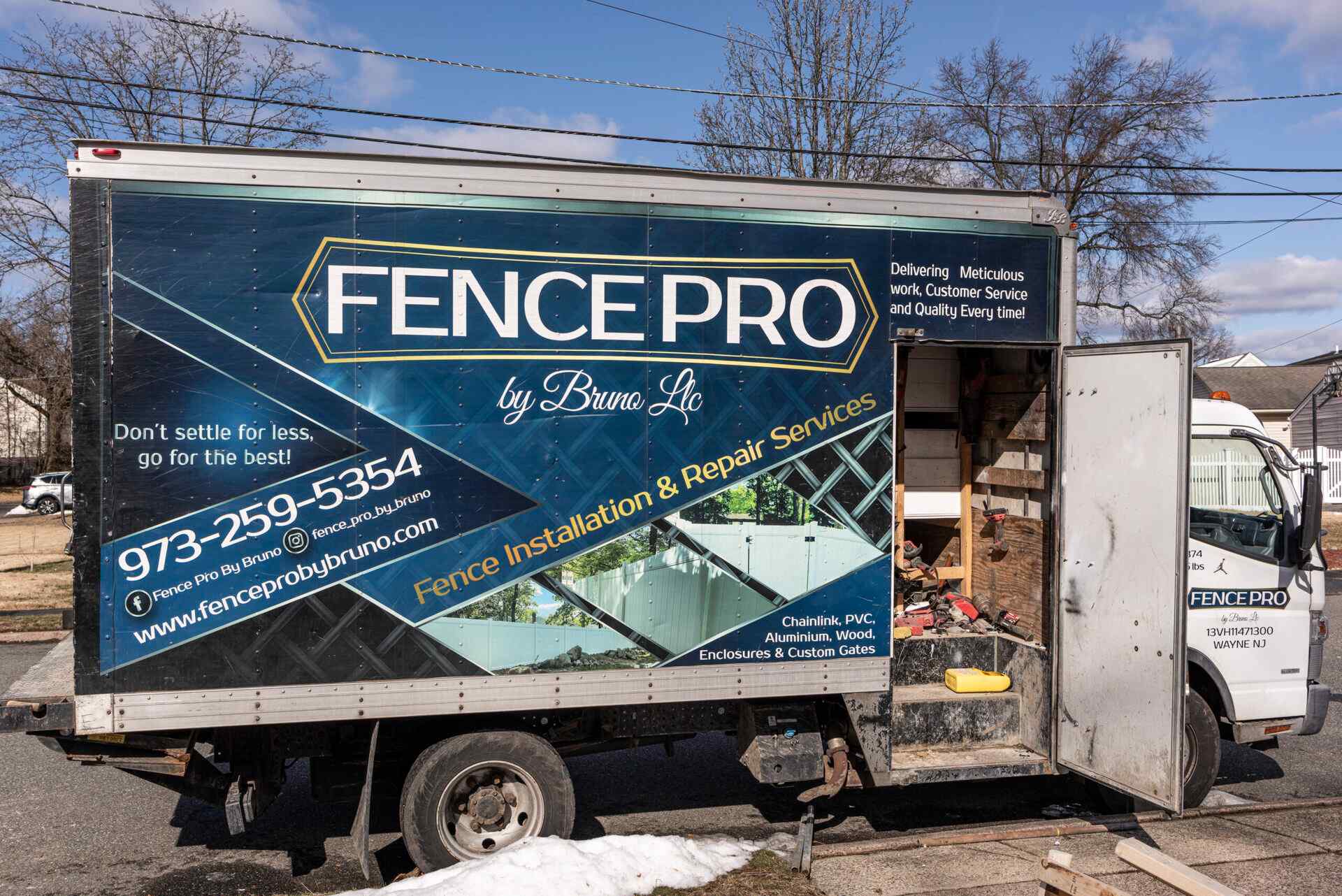 Fence Pro by Bruno box truck with the slogan 'Don't settle for less, go for the best'