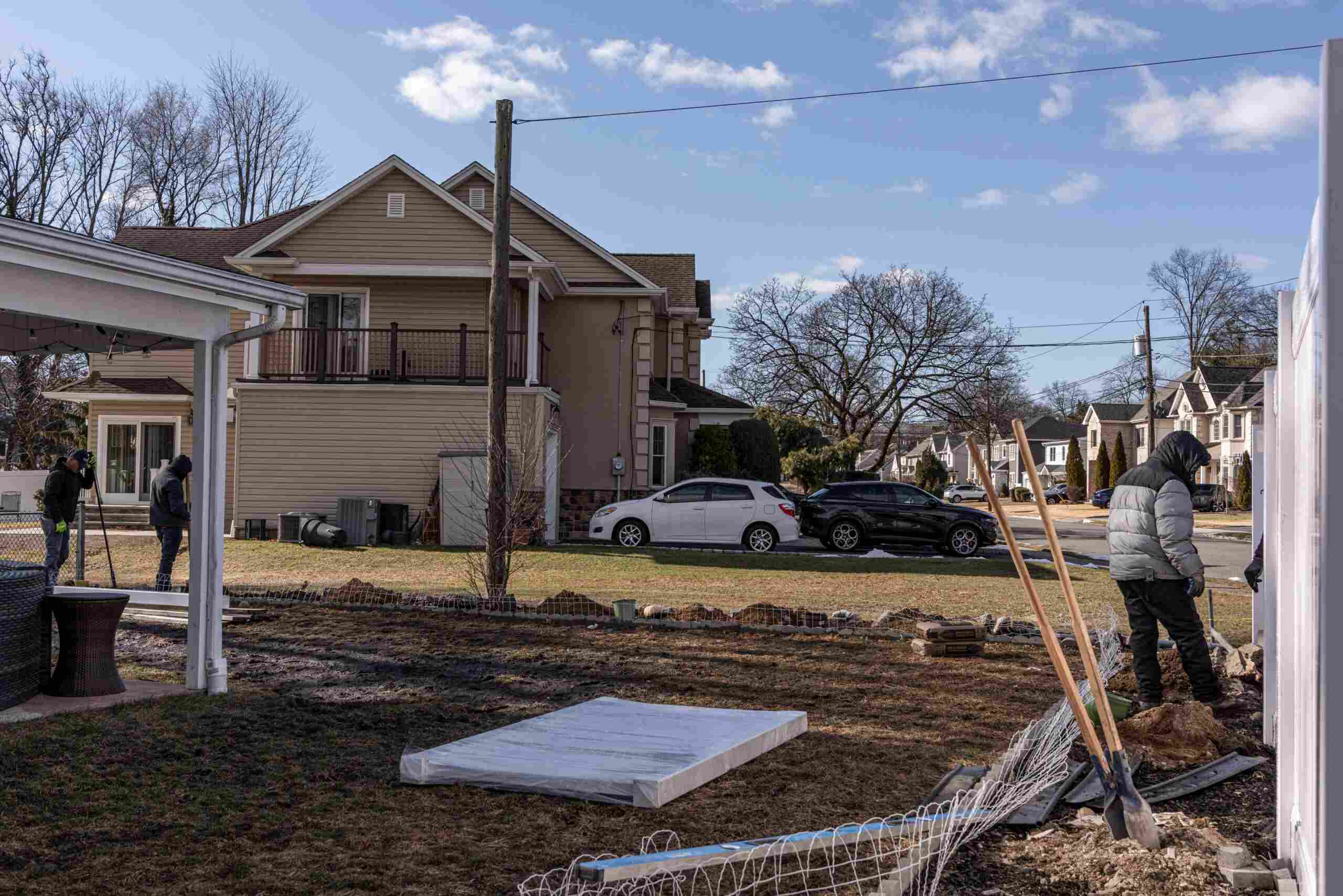 Fence Pro by Bruno crew installing a fence in a residential backyard